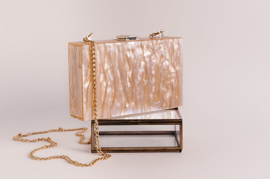 Cerith Blush Clutch Bag