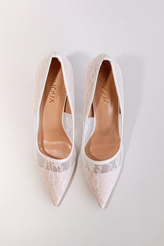 Pair of white chantilly lace high heeled pumps with pointed toe