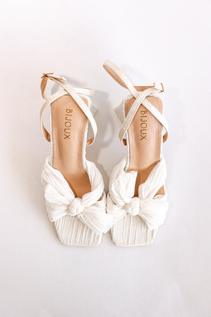 White pleated chiffon high-heeled sandals with knotted bow detail, square toe and block heel 